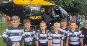 JW Hughes sponsors young rugby team